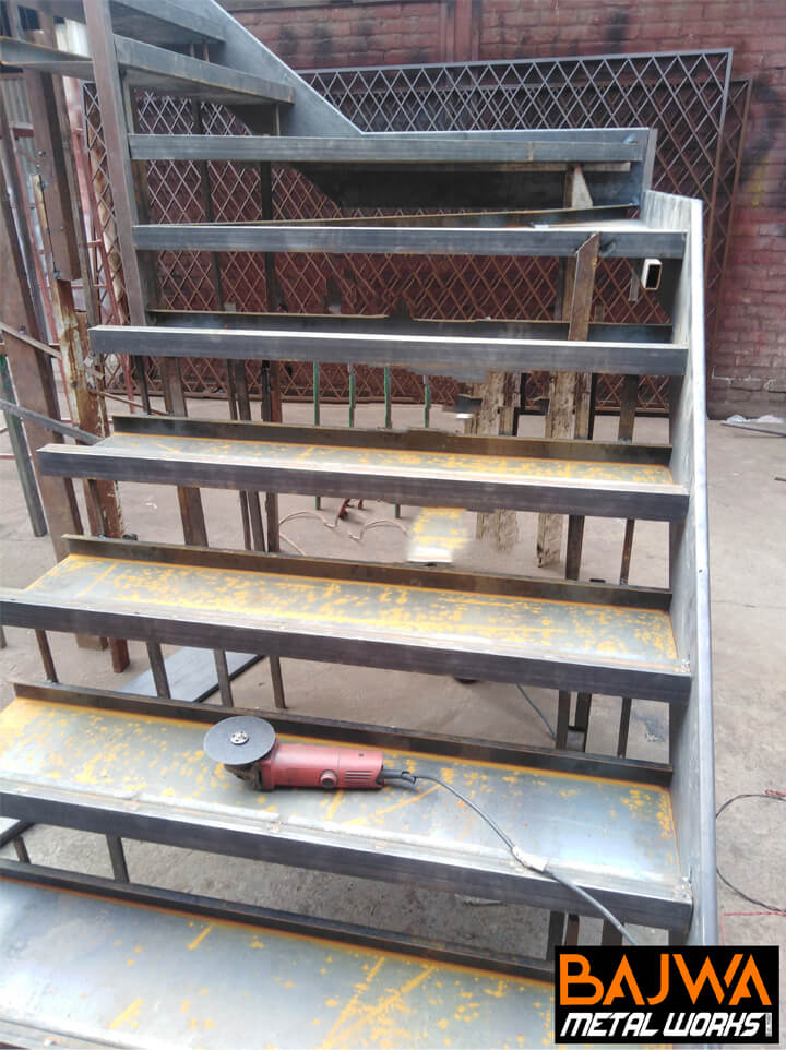 Multi level multi span metal staircase